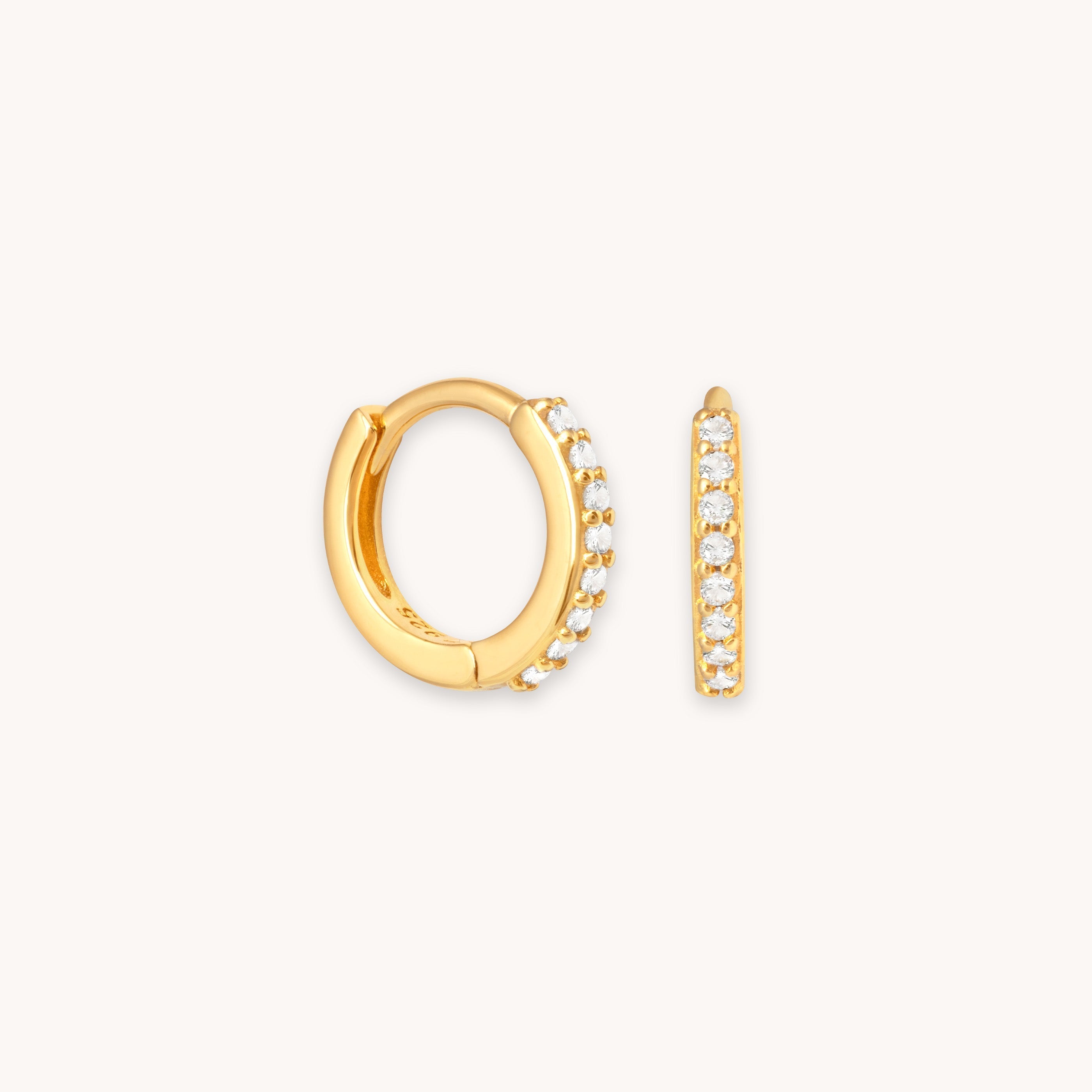 April Birthstone Huggies in Gold with White CZ